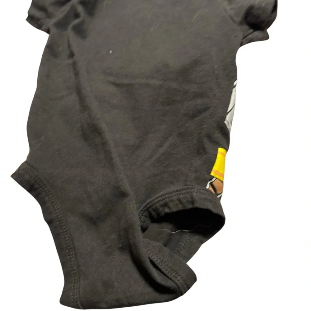 Black Baby Onesie with Blue Dots and Yellow Belt Design